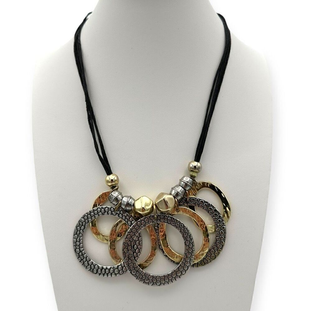 Chico's princess length necklace with gold/silver toned circles and stones on a